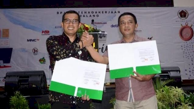 Ketua PWI Malang Raya, Cahyono bersama Kepala BPJS Ketenagakerjaan Malang Raya, Imam Santoso/Ist