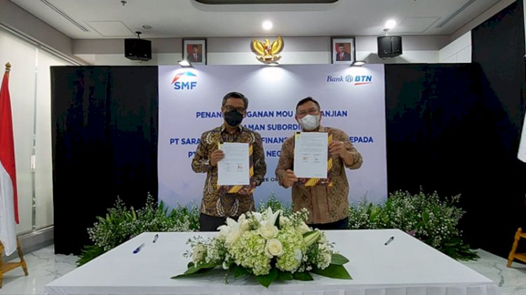 Penandatanganan perjanjian pinjaman antara SMF dan Bank BTN di Grha SMF, Kebayoran Baru Jakarta Selatan, pada Selasa (26/10)./Dok