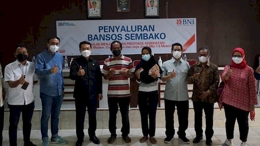 Penyaluran bantuan sosial kepada masyarakat Kecamatan Binjai Utara, Sabtu, 12 Februari 2022/Ist