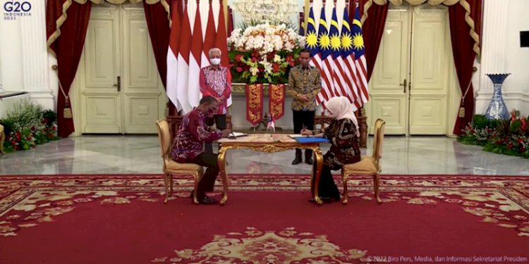 Penandatanganan Memorandum of Understanding (MoU) atau Nota Kesepahaman pemerintah Indonesia dan Malaysia terkait dengan penempatan dan perlindungan Pekerja Migran Indonesia/Repro