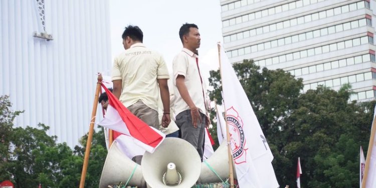Ketua Presidium PP KMHDI I Putu Yoga Saputra saat aksi turun jalan, Jumat (2/9)/RMOL