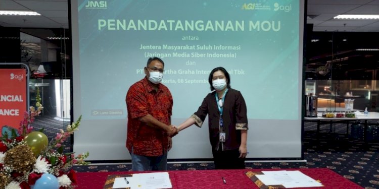 Wakil Direktur Utama PT Bank Artha Graha Internasional Christina Harapan bersama Ketua Umum JMSI Teguh Santosa/RMOL