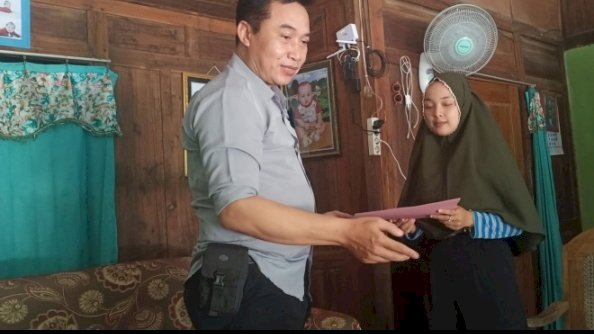 Caption : Keluarga almarhum Kusaini. 