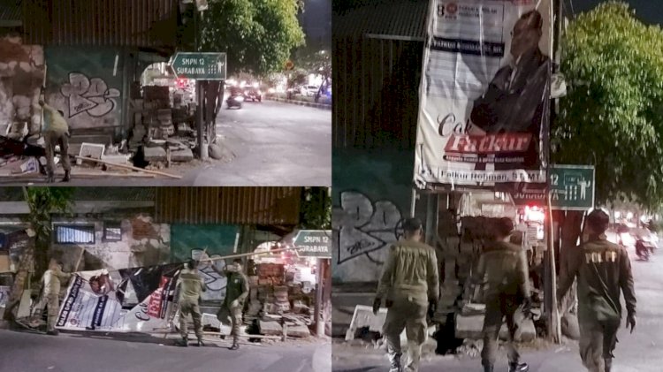 Teks foto: Satpol PP Surabaya tertibkn baliho nacaleg/ist
