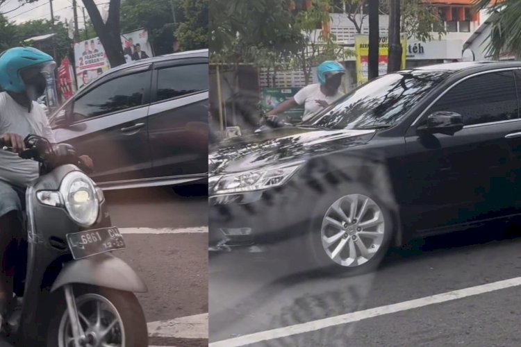 Teks foto: video viral di medsos, pemotor diduga minta uang dengan modus ketuk kaca mobil di traffic light Surabaya/ist