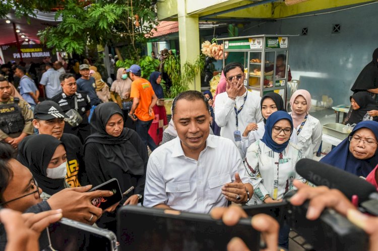 Teks foto: Eri Cahyadi bersama Rini Indriyani/RMOLJatim