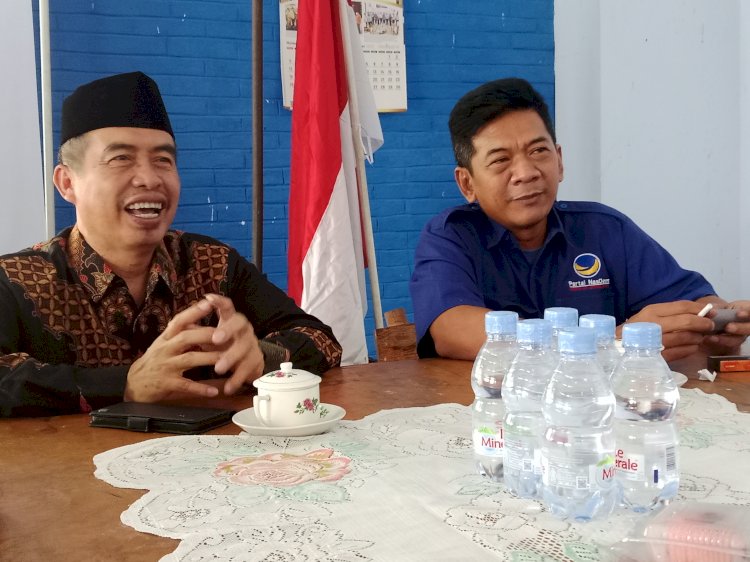 Hari Wuryanto dan ketua DPD Partai Nasdem Taupan Devyanto /RMOLJatim