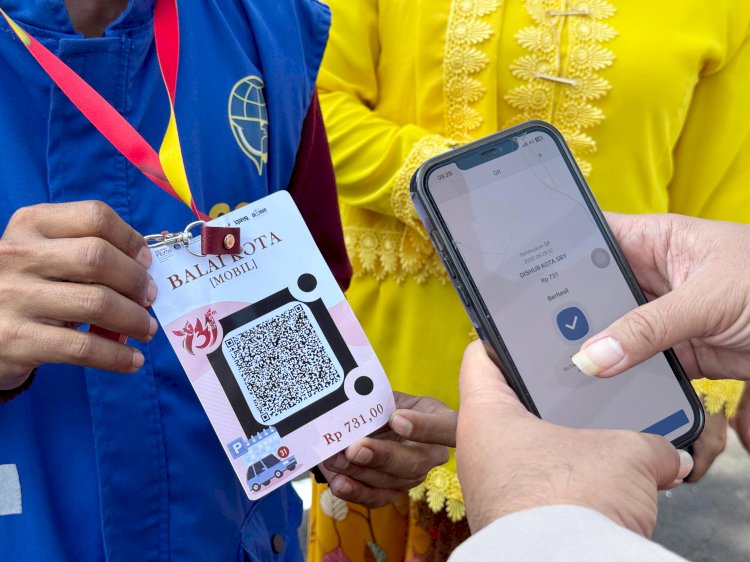 Teks foto: Pembayaran non tunai atau elektronik melalui QRIS/ist